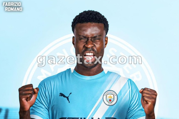 Arrihet marrëveshja, Guhei te Manchester City